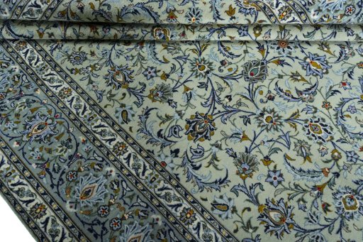 Close-up detail of 2000s Kashan rug from Iran / Persia showing Wool weave