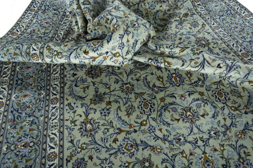Surface texture of 2000s Kashan rug with natural Wool and intricate pattern