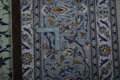 Central medallion detail of 2000s Kashan rug from Iran / Persia