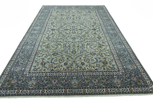 Surface texture of 2000s Kashan rug with natural Wool and intricate pattern