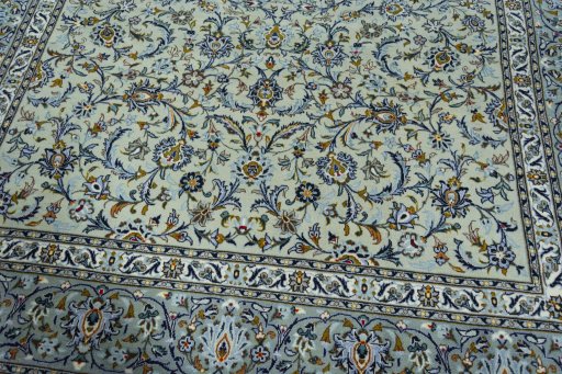Close-up detail of 2000s Kashan rug from Iran / Persia showing Wool weave