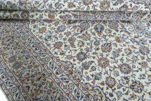 Close-up detail of 2000s Kashan rug from Iran / Persia showing Wool weave