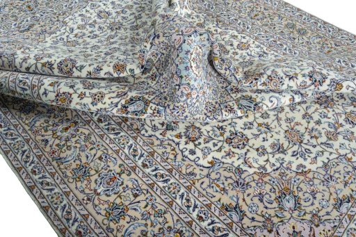 Surface texture of 2000s Kashan rug with natural Wool and intricate pattern