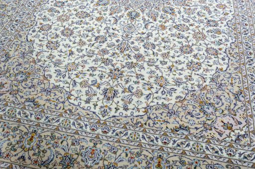 Close-up detail of 2000s Kashan rug from Iran / Persia showing Wool weave