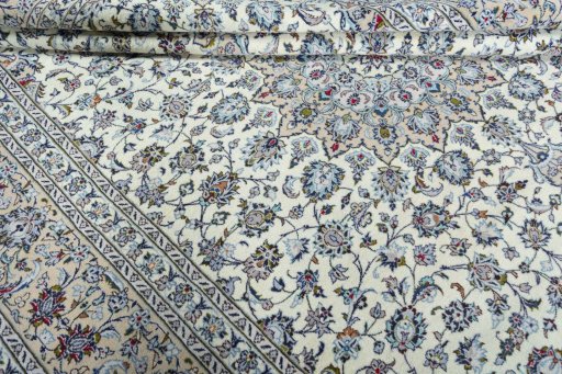Close-up detail of 2000s Kashan rug from Iran / Persia showing Wool weave