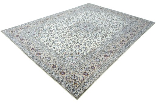 Corner detail of 2000s Kashan rug showing border pattern and Wool pile
