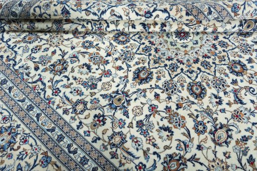 Close-up detail of 2000s Kashan rug from Iran / Persia showing Wool weave