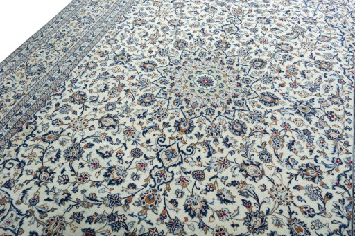 Backside of handmade 2000s Kashan rug showing knot structure and weave density
