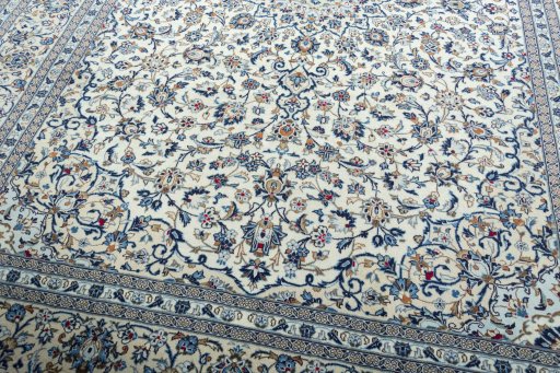 Close-up detail of 2000s Kashan rug from Iran / Persia showing Wool weave