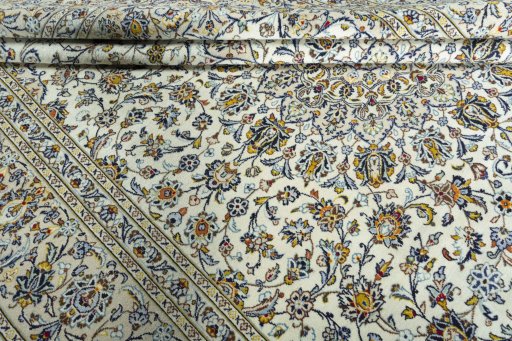 Close-up detail of 2000s Kashan rug from Iran / Persia showing Wool weave