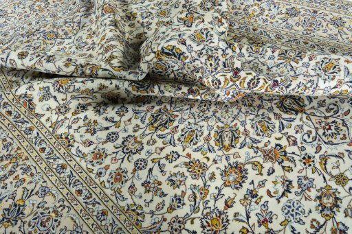 Surface texture of 2000s Kashan rug with natural Wool and intricate pattern