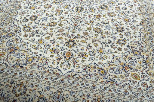 Close-up detail of 2000s Kashan rug from Iran / Persia showing Wool weave