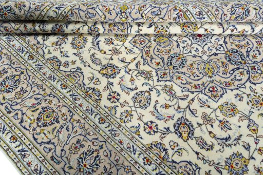 Close-up detail of 2000s Kashan rug from Iran / Persia showing Wool weave
