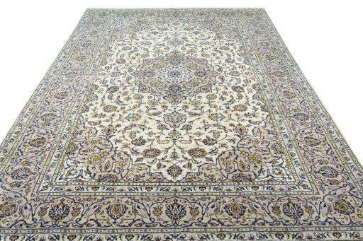 Surface texture of 2000s Kashan rug with natural Wool and intricate pattern