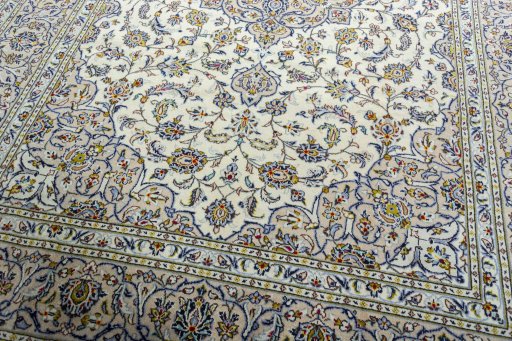 Close-up detail of 2000s Kashan rug from Iran / Persia showing Wool weave