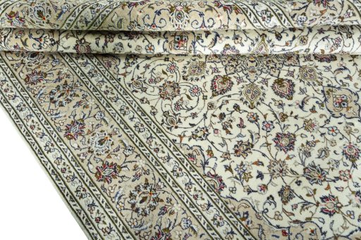 Close-up detail of 2000s Kashan rug from Iran / Persia showing Wool weave