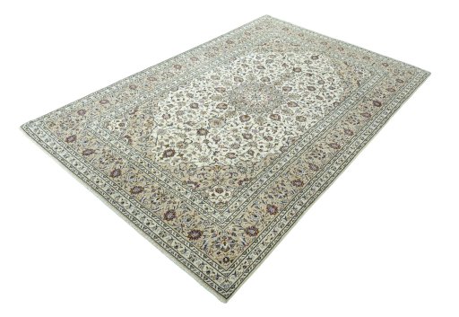Corner detail of 2000s Kashan rug showing border pattern and Wool pile