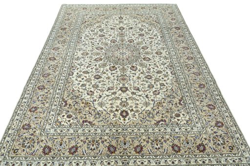 Surface texture of 2000s Kashan rug with natural Wool and intricate pattern