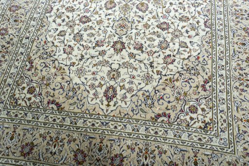 Close-up detail of 2000s Kashan rug from Iran / Persia showing Wool weave