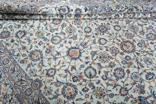 Close-up detail of 2000s Kashan rug from Iran / Persia showing Wool weave