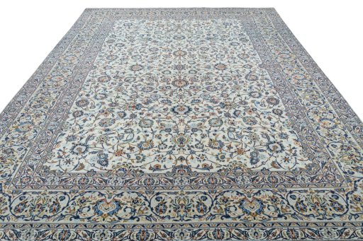 Surface texture of 2000s Kashan rug with natural Wool and intricate pattern