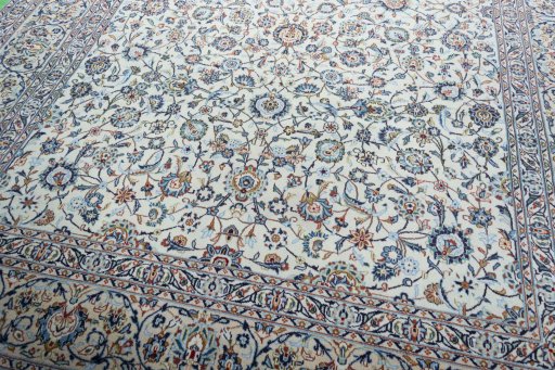 Close-up detail of 2000s Kashan rug from Iran / Persia showing Wool weave