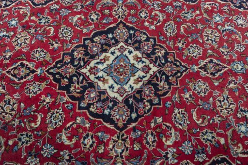 Central medallion detail of 2000s Kashan rug from Iran / Persia