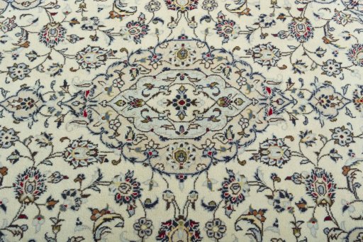 Central medallion detail of 2000s Kashan rug from Iran / Persia