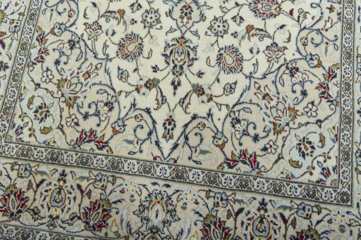 Close-up detail of 2000s Kashan rug from Iran / Persia showing Wool weave