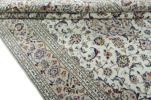 Close-up detail of 2000s Kashan rug from Iran / Persia showing Wool weave