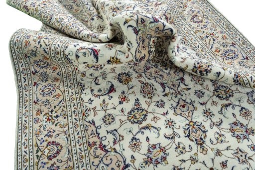 Surface texture of 2000s Kashan rug with natural Wool and intricate pattern