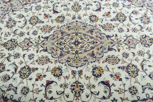 Central medallion detail of 2000s Kashan rug from Iran / Persia
