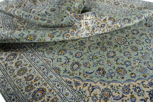Surface texture of 2000s Kashan rug with natural Wool and intricate pattern