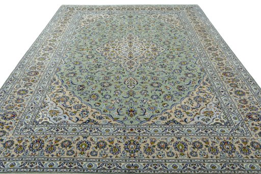 Surface texture of 2000s Kashan rug with natural Wool and intricate pattern