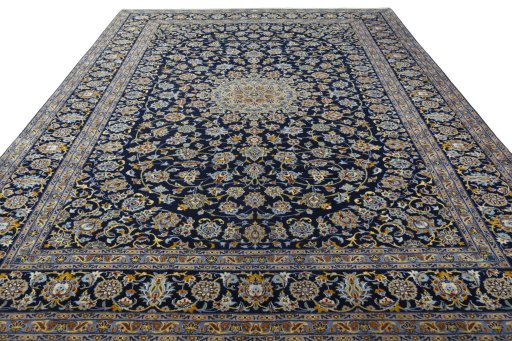 Surface texture of 2000s Kashan rug with natural Wool and intricate pattern