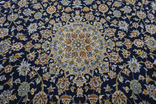 Central medallion detail of 2000s Kashan rug from Iran / Persia