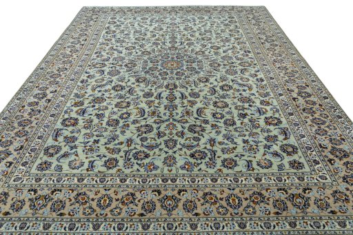 Surface texture of 2000s Kashan rug with natural Wool and intricate pattern