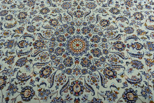 Central medallion detail of 2000s Kashan rug from Iran / Persia