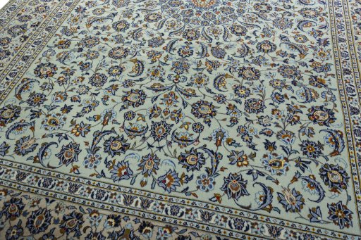 Close-up detail of 2000s Kashan rug from Iran / Persia showing Wool weave