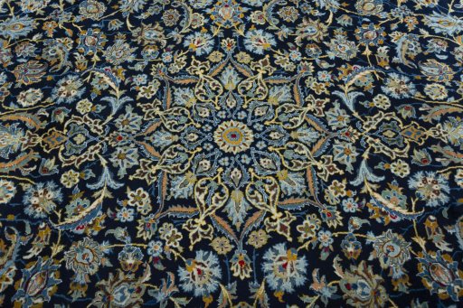 Central medallion detail of 2000s Kashan rug from Iran / Persia