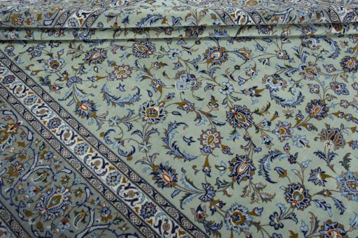 Close-up detail of 2000s Kashan rug from Iran / Persia showing Wool weave