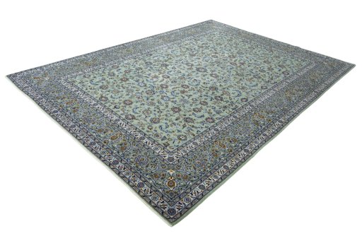 Corner detail of 2000s Kashan rug showing border pattern and Wool pile