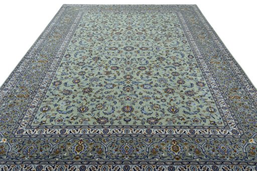 Surface texture of 2000s Kashan rug with natural Wool and intricate pattern