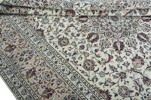 Close-up detail of 2000s Kashan rug from Iran / Persia showing Wool weave