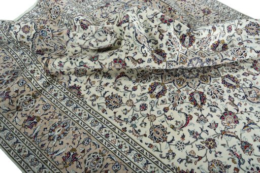Surface texture of 2000s Kashan rug with natural Wool and intricate pattern
