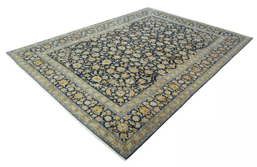 Corner detail of 2000s Kashan rug showing border pattern and Wool pile