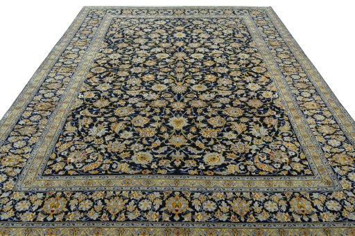 Surface texture of 2000s Kashan rug with natural Wool and intricate pattern