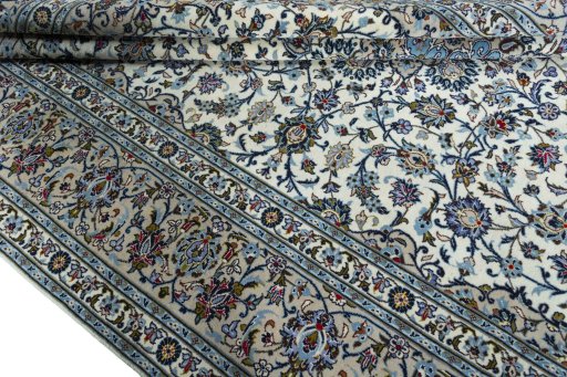 Close-up detail of 2000s Kashan rug from Iran / Persia showing Wool weave