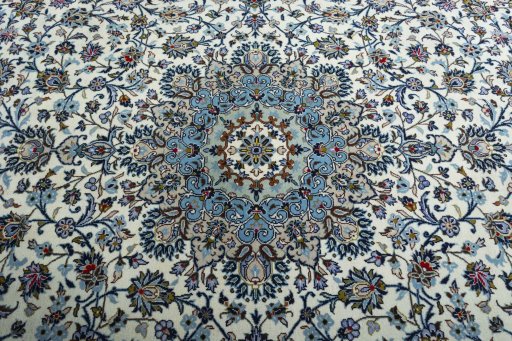 Central medallion detail of 2000s Kashan rug from Iran / Persia