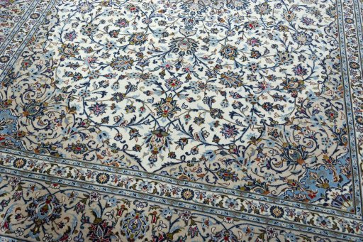Close-up detail of 2000s Kashan rug from Iran / Persia showing Wool weave